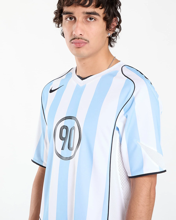Remera Nike Total 90 Celeste